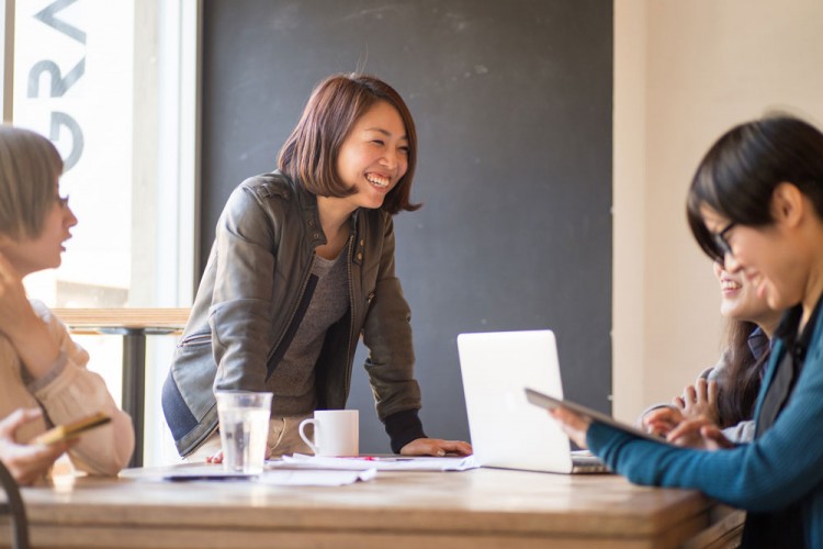 Image of students talking to each other