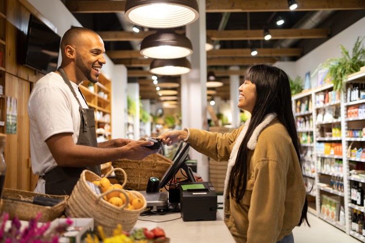 Two employees handshaking