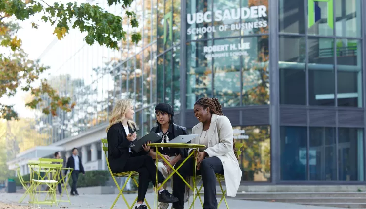 Sauder stock image with three students